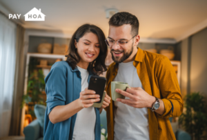 A couple uses their HOA app to stay up to date with their neighborhood.